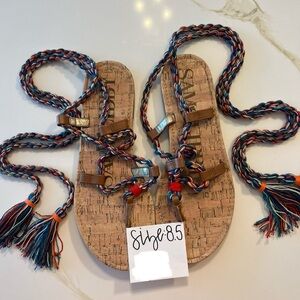 Size 8.5 colorful sandals for sale. Tie up calf. Good condition.